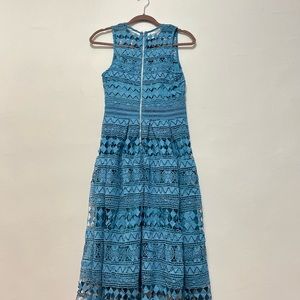 This is a cute aqua dress. If you are size 4 it would fit perfectly.